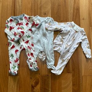 Three baby footed sleepers